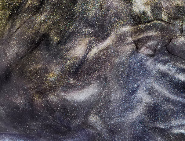 Close-up of a metallic epoxy surface with pigment movement